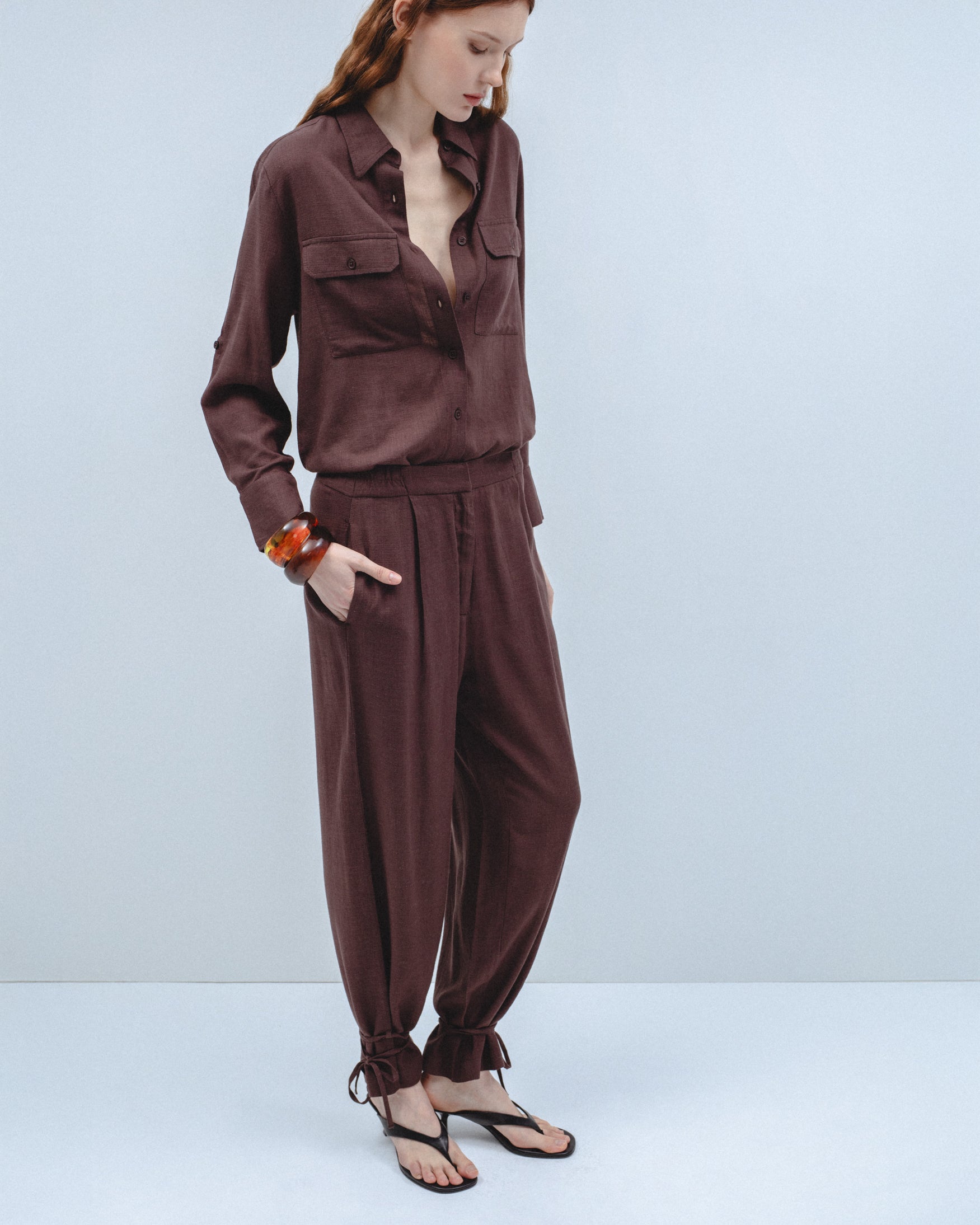 Pantalón Pliegues Bajo Lazos