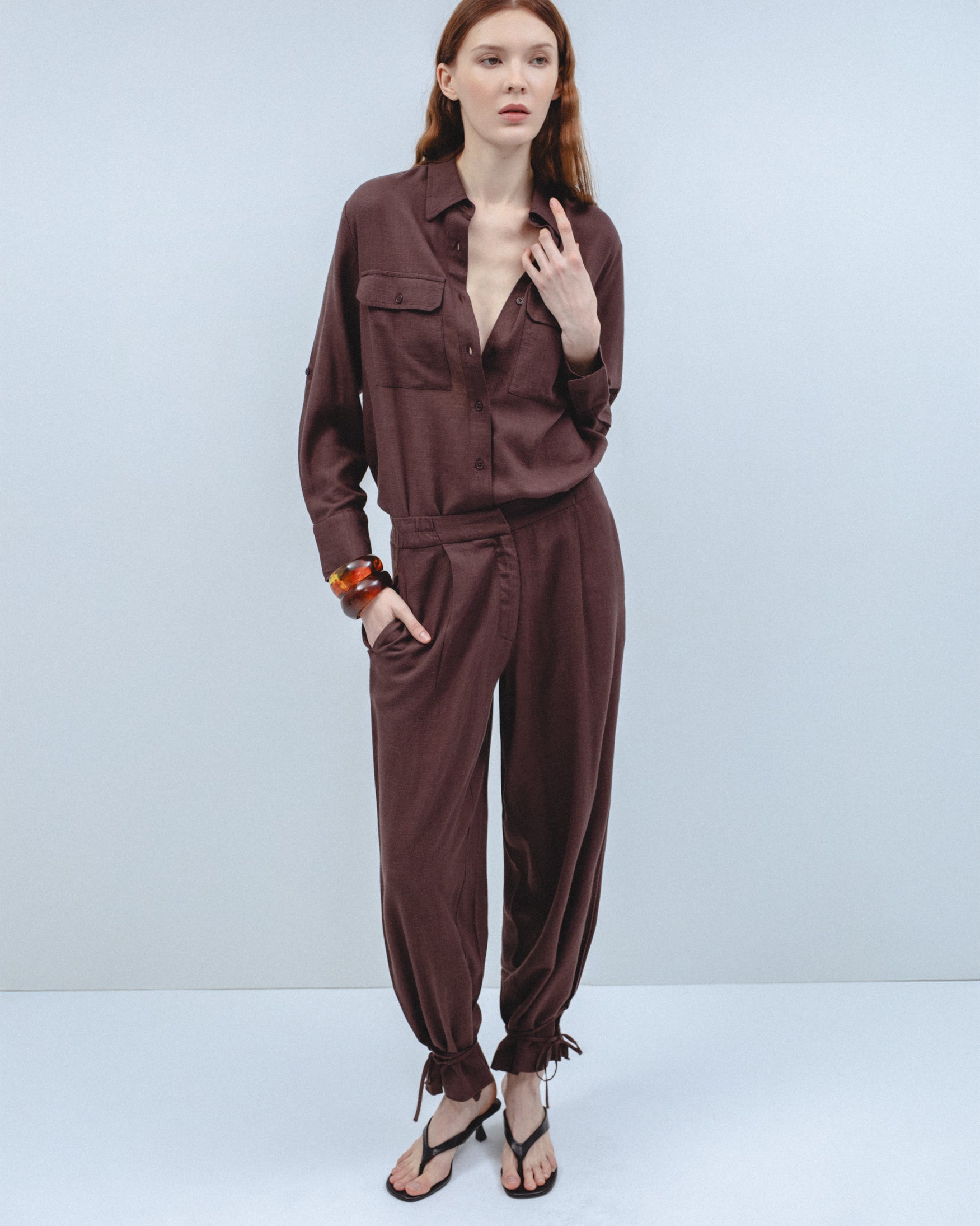 Pantalón Pliegues Bajo Lazos