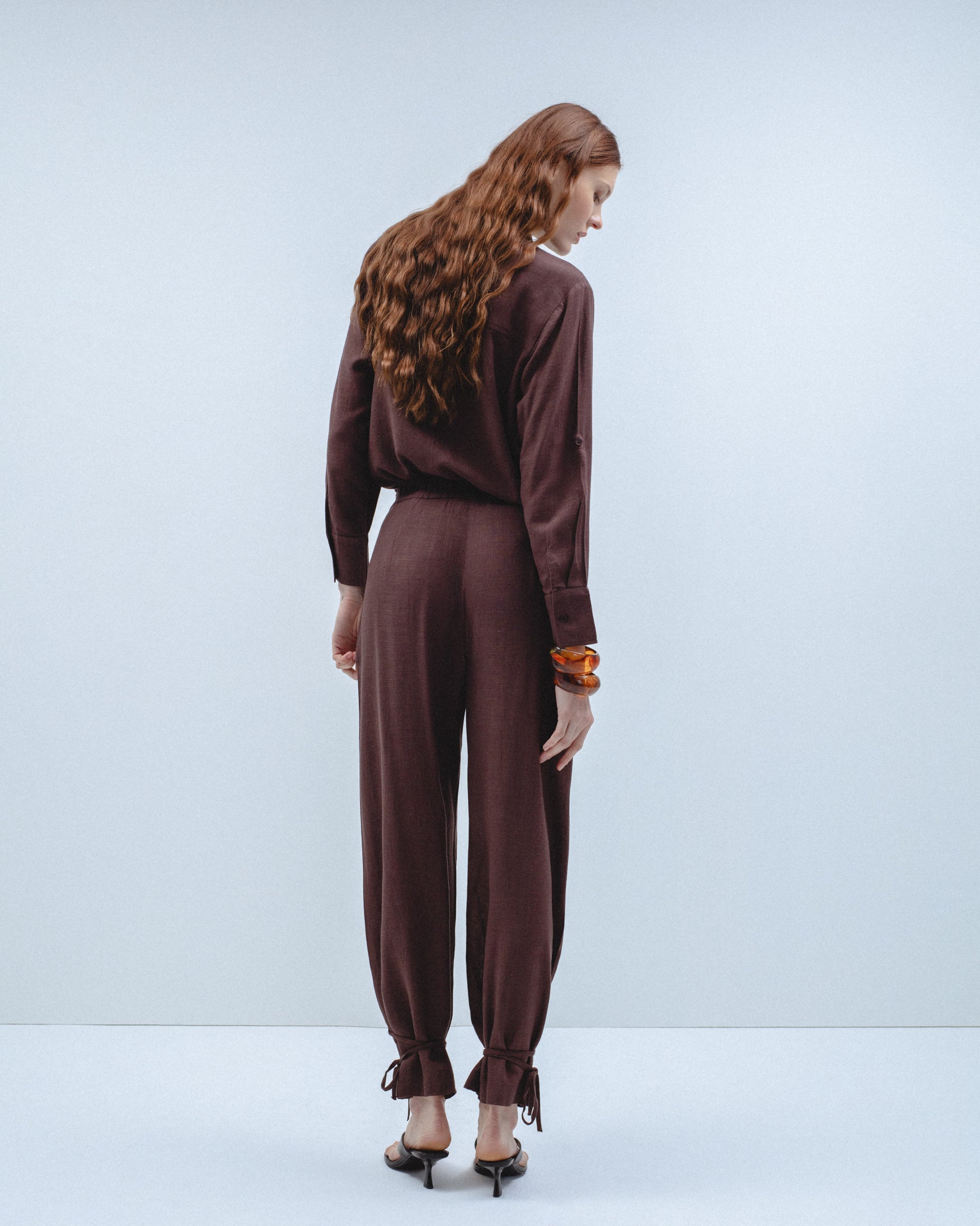 Pantalón Pliegues Bajo Lazos