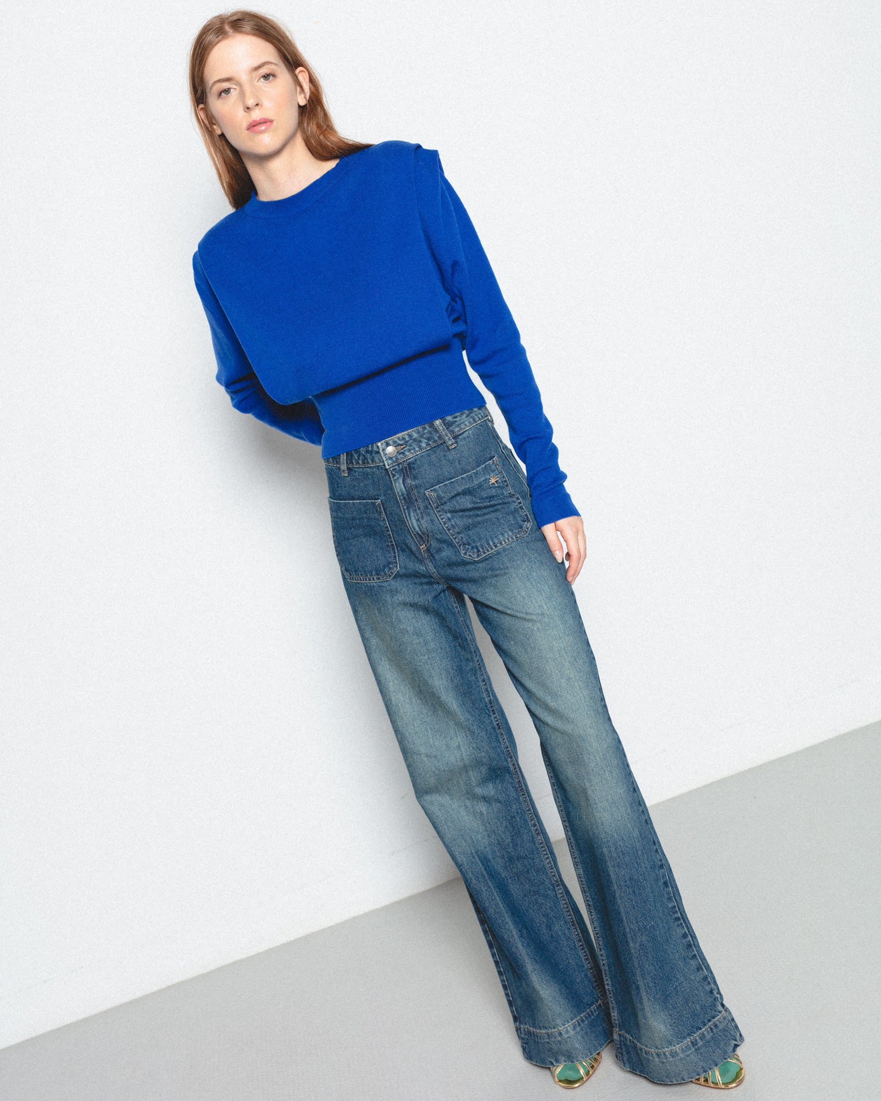 Jeans Flare Tiro Alto Bolsillos
