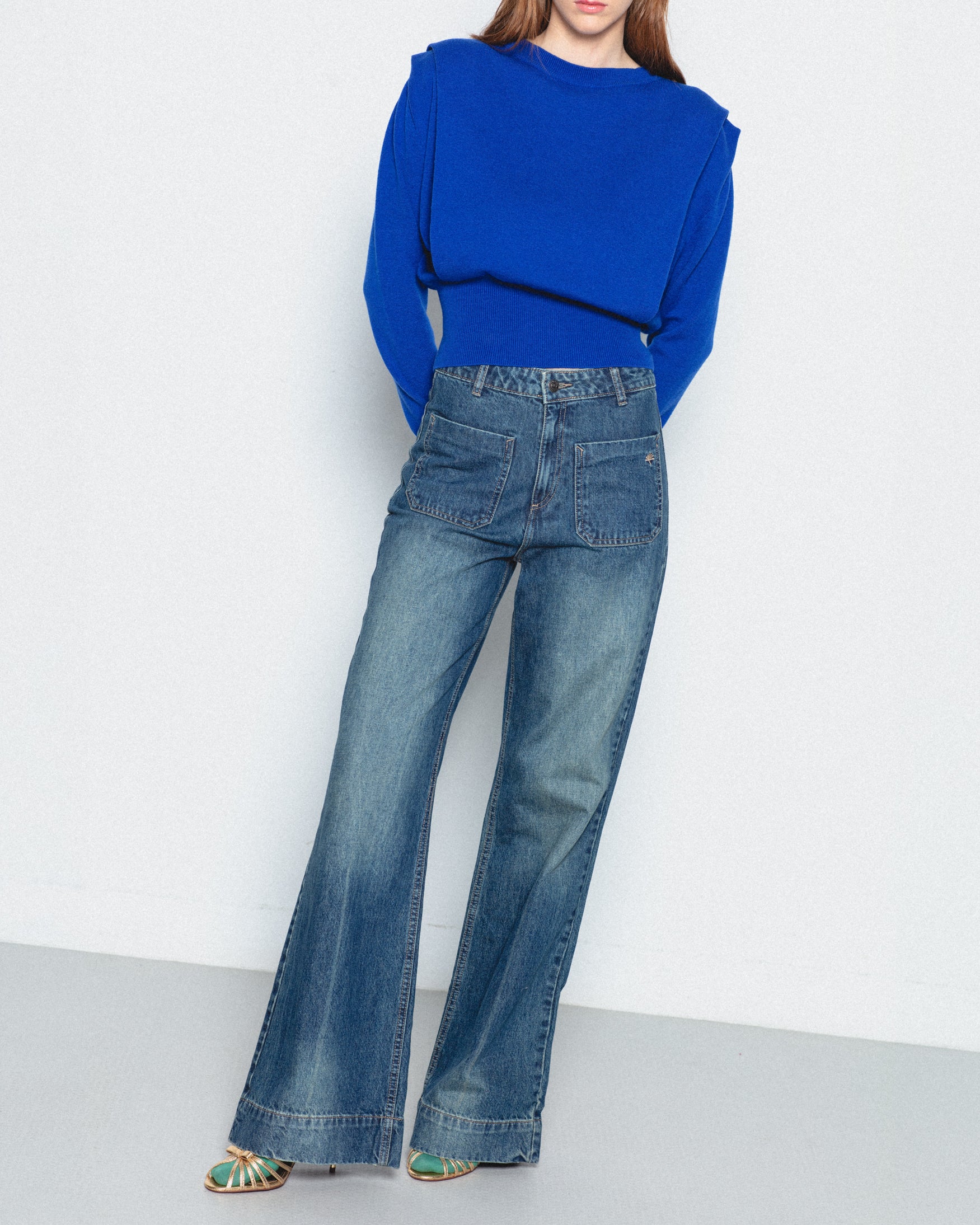 Jeans Flare Tiro Alto Bolsillos